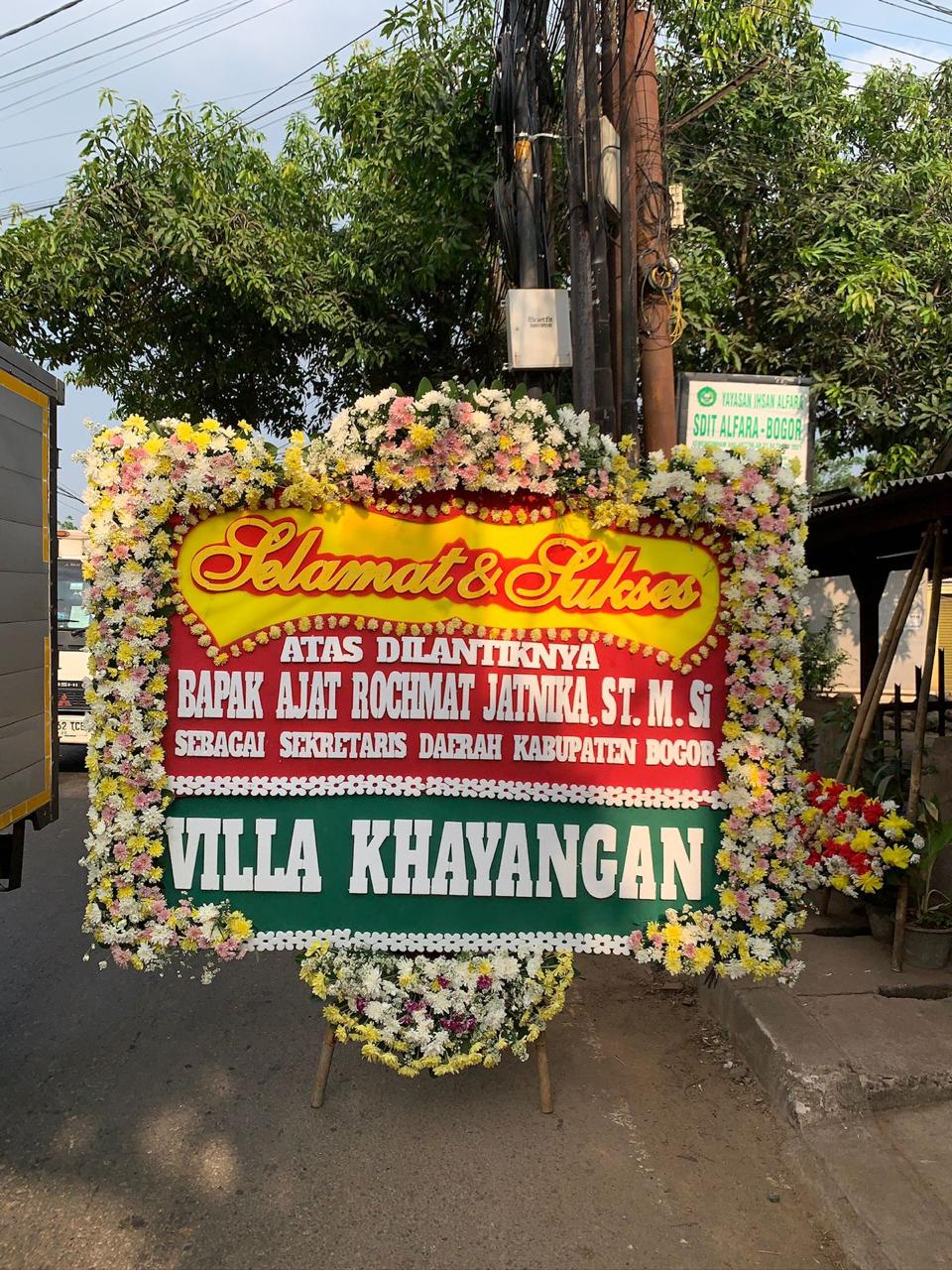 Karangan bunga papan ucapan selamat di Telukjambe